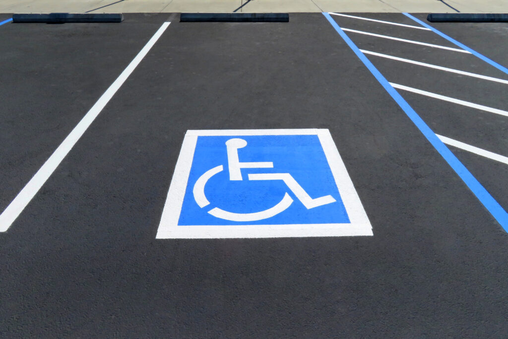 Freshly,Resurfaced,And,Repainted,Handicap,Parking,Space,In,A,Parking